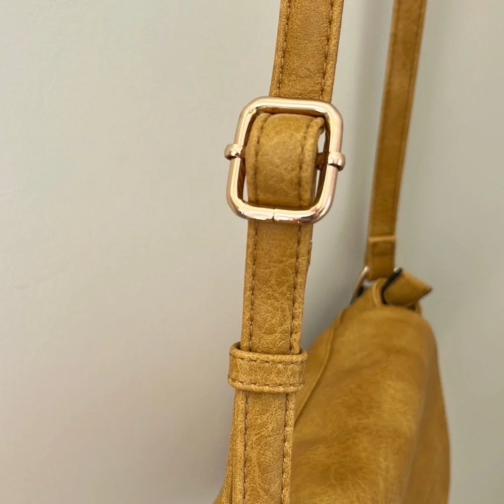 Alyssa vegan leather flap over crossbody handbag purse with tassels. NWT